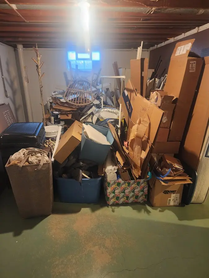 Roll-off dumpster container at job site for 15 Yard Dumpster Rental in Stroud